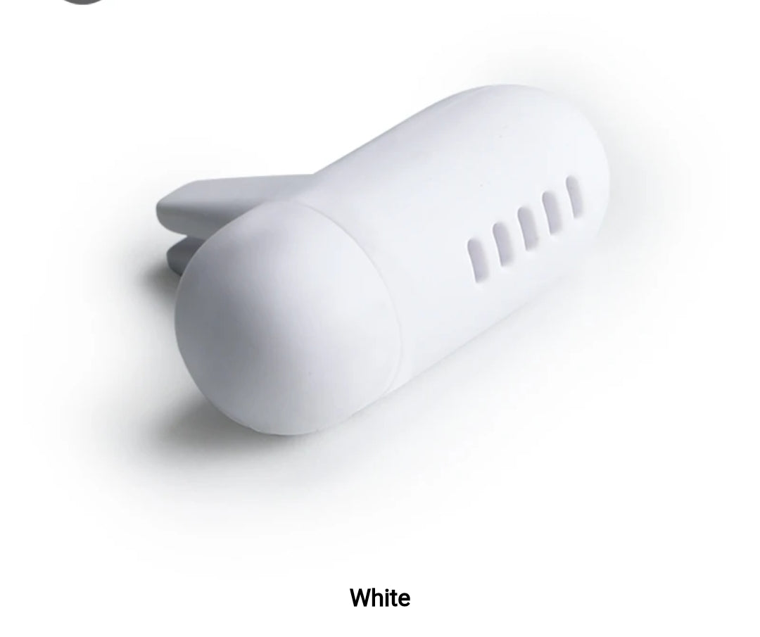 A picture showing the white coloured car delish car air freshener.